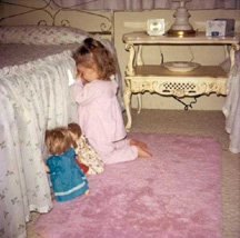 Girl with Dolls Praying